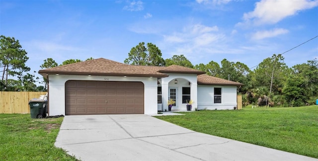 7450 Franzino Ave, North Port, FL 34291 - ranch-style home featuring a garage, stucco siding, and driveway