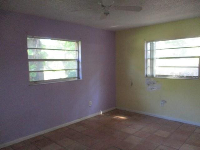 5304 Galloway Rd, Apopka, FL 32712 - tiled spare room featuring plenty of natural light and ceiling fan