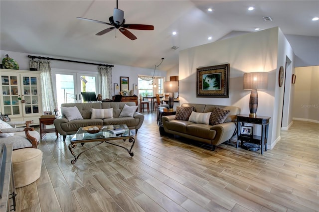 1624 Bear Crossing Cir, Apopka, FL 32703 - living room with a ceiling fan, light wood-style floors, high vaulted ceiling, and recessed lighting