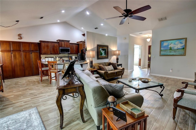 1624 Bear Crossing Cir, Apopka, FL 32703 - living area featuring a ceiling fan, light wood-style floors, high vaulted ceiling, and recessed lighting