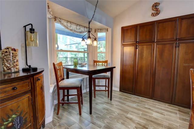 1624 Bear Crossing Cir, Apopka, FL 32703 - dining space with vaulted ceiling and light wood-type flooring