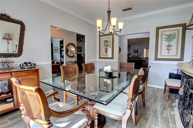 1624 Bear Crossing Cir, Apopka, FL 32703 - dining room featuring crown molding and a chandelier