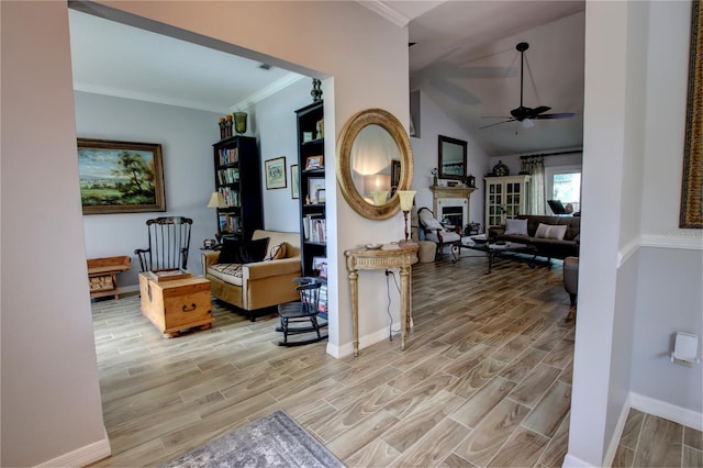1624 Bear Crossing Cir, Apopka, FL 32703 - corridor featuring light wood-style flooring, vaulted ceiling, and ornamental molding