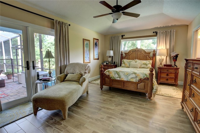 1624 Bear Crossing Cir, Apopka, FL 32703 - bedroom featuring access to exterior, light wood-style floors, and ceiling fan