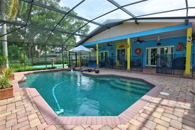 1624 Bear Crossing Cir, Apopka, FL 32703 - view of swimming pool with ceiling fan, a patio area, french doors, and glass enclosure