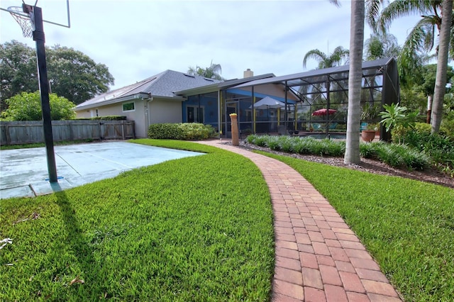 1624 Bear Crossing Cir, Apopka, FL 32703 - rear view of house featuring a patio area, stucco siding, a lanai, and a chimney