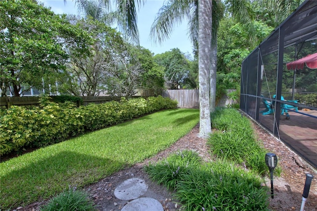 1624 Bear Crossing Cir, Apopka, FL 32703 - fenced backyard featuring a lanai