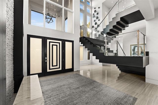12264 Montalcino Cir, Windermere, FL 34786 - foyer entrance with a towering ceiling and stairway
