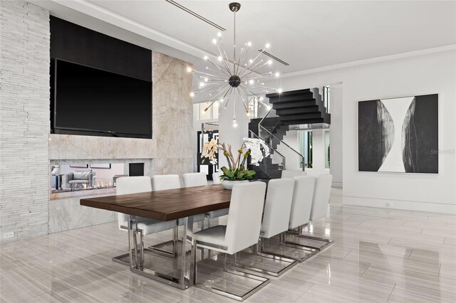 12264 Montalcino Cir, Windermere, FL 34786 - dining room with a chandelier, stairs, and tile patterned floors