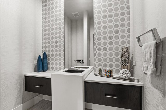 12264 Montalcino Cir, Windermere, FL 34786 - laundry area with wood finished floors