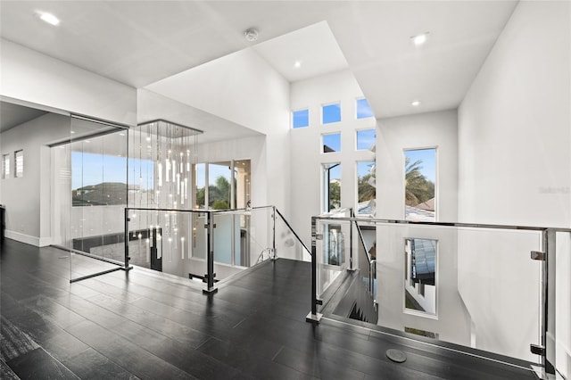 12264 Montalcino Cir, Windermere, FL 34786 - hall featuring an upstairs landing, wood finished floors, and recessed lighting
