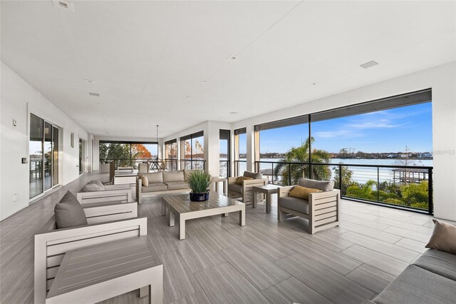 12264 Montalcino Cir, Windermere, FL 34786 - deck featuring an outdoor living space and a water view