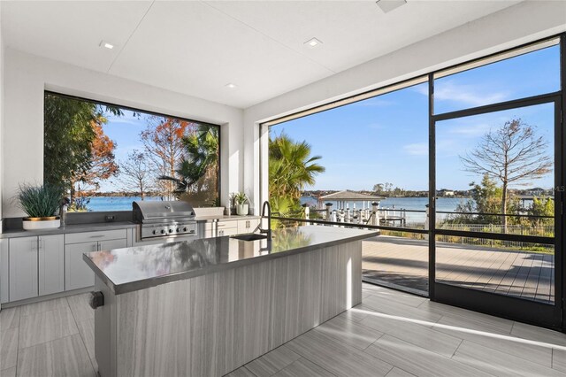 12264 Montalcino Cir, Windermere, FL 34786 - unfurnished office featuring a water view and a sink