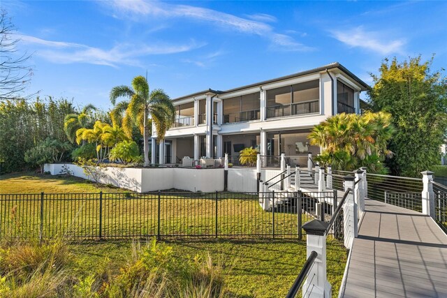 12264 Montalcino Cir, Windermere, FL 34786 - back of house featuring a fenced backyard and stairs