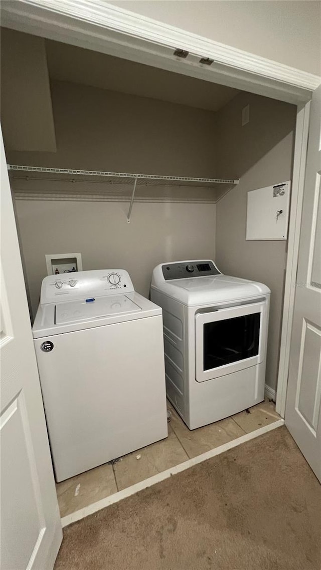 8625 Coventry Park Way, Windermere, FL 34786 - laundry room featuring independent washer and dryer and light colored carpet