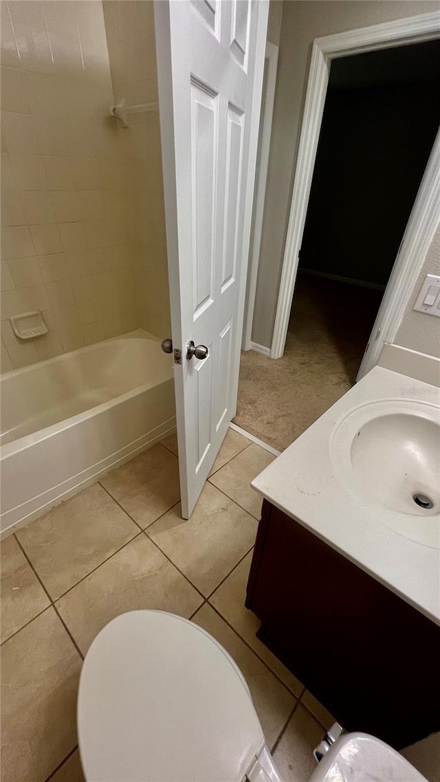 8625 Coventry Park Way, Windermere, FL 34786 - full bathroom featuring vanity, tile patterned floors, and washtub / shower combination