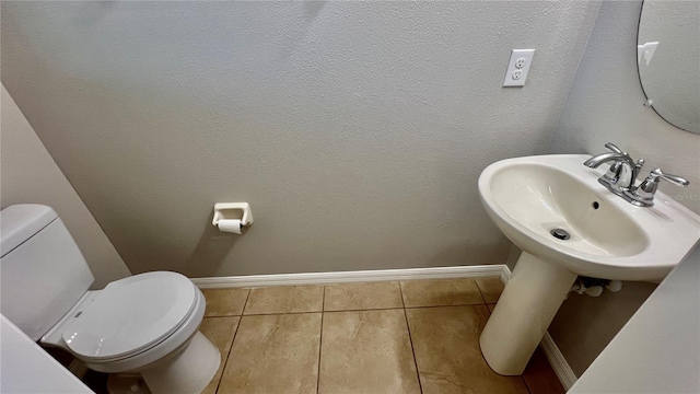 8625 Coventry Park Way, Windermere, FL 34786 - bathroom featuring baseboards and tile patterned flooring