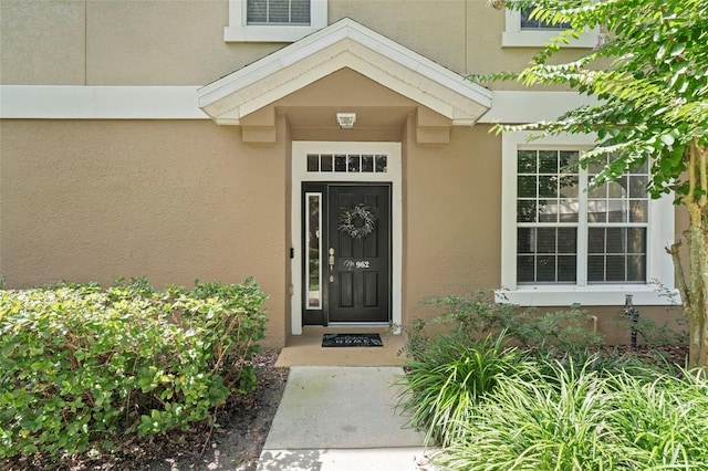 962 Ashworth Overlook Dr Unit C, Apopka, FL 32712 - doorway to property featuring stucco siding