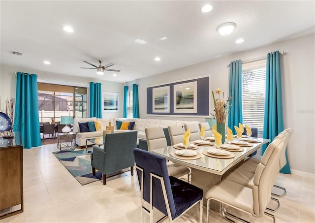 8874 Qin Loop, Kissimmee, FL 34747 - dining area with plenty of natural light, a ceiling fan, recessed lighting, and light tile patterned floors