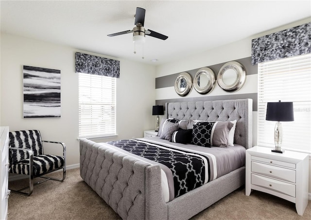 8874 Qin Loop, Kissimmee, FL 34747 - carpeted bedroom with ceiling fan and baseboards