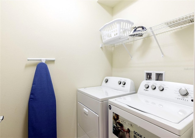 8874 Qin Loop, Kissimmee, FL 34747 - laundry room featuring washing machine and clothes dryer