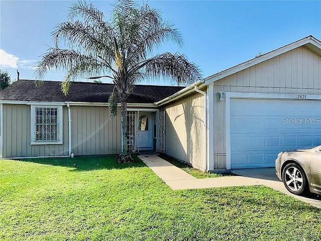 2821 Sweet Springs St, Deltona, FL 32738 - ranch-style home featuring a garage, a front yard, and driveway