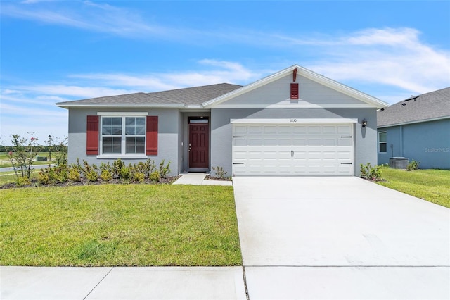 1850 Walnut Creek Dr, Kissimmee, FL 34744 - ranch-style house featuring a front lawn, an attached garage, concrete driveway, and stucco siding