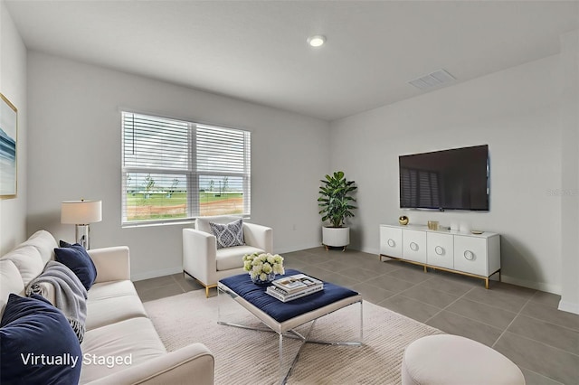 1850 Walnut Creek Dr, Kissimmee, FL 34744 - tiled living area with baseboards