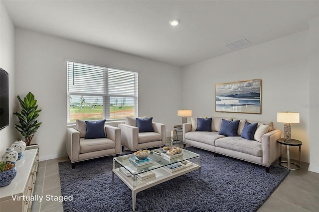 1850 Walnut Creek Dr, Kissimmee, FL 34744 - living area featuring light tile patterned flooring