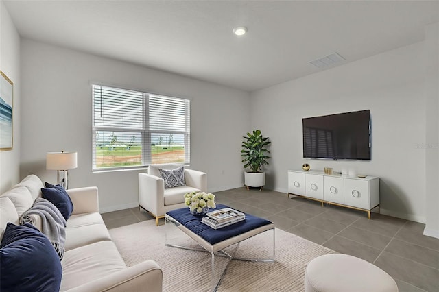 1850 Walnut Creek Dr, Kissimmee, FL 34744 - tiled living room with baseboards