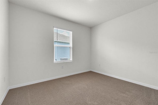 1850 Walnut Creek Dr, Kissimmee, FL 34744 - spare room featuring carpet flooring
