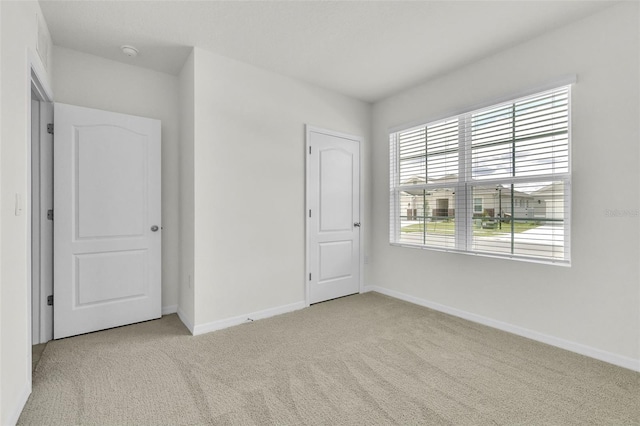 1850 Walnut Creek Dr, Kissimmee, FL 34744 - unfurnished bedroom featuring carpet flooring and baseboards