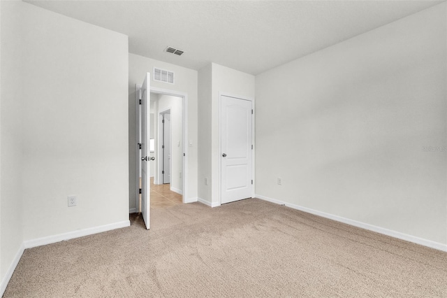 1850 Walnut Creek Dr, Kissimmee, FL 34744 - unfurnished bedroom featuring carpet and baseboards