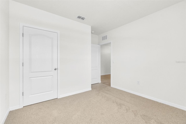 1850 Walnut Creek Dr, Kissimmee, FL 34744 - unfurnished bedroom featuring carpet flooring and baseboards