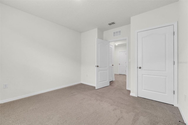 1850 Walnut Creek Dr, Kissimmee, FL 34744 - unfurnished bedroom featuring carpet floors and baseboards