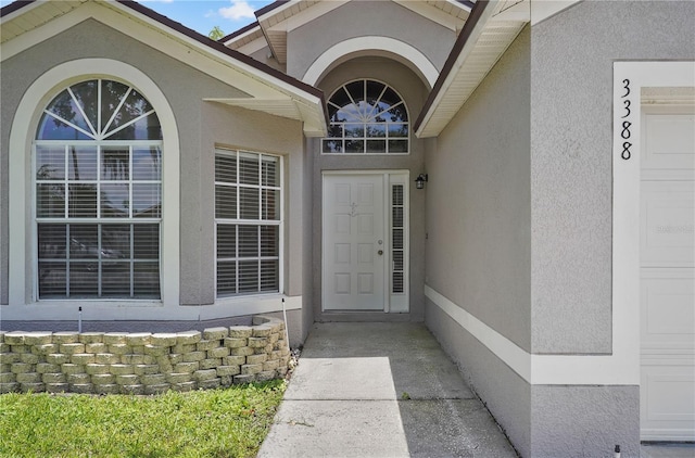 3388 Cypress Point Cir, Saint Cloud, FL 34772 - doorway to property with stucco siding
