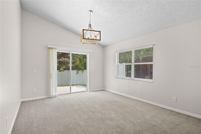 3388 Cypress Point Cir, Saint Cloud, FL 34772 - carpeted spare room with a chandelier and a textured ceiling