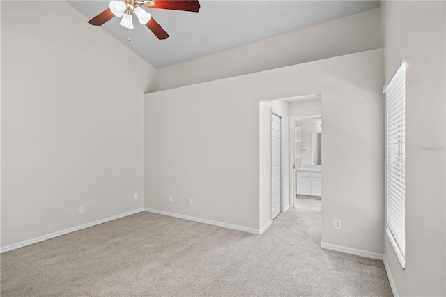 3388 Cypress Point Cir, Saint Cloud, FL 34772 - spare room featuring a ceiling fan, light colored carpet, and lofted ceiling