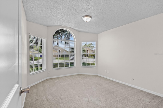 3388 Cypress Point Cir, Saint Cloud, FL 34772 - carpeted spare room featuring a textured ceiling and baseboards