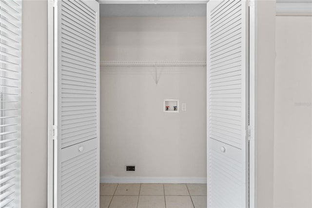 3388 Cypress Point Cir, Saint Cloud, FL 34772 - laundry room with washer hookup and light tile patterned floors