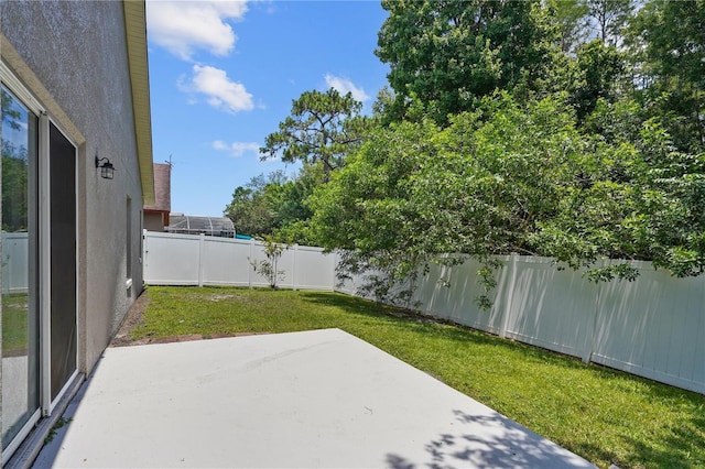 3388 Cypress Point Cir, Saint Cloud, FL 34772 - fenced backyard with a patio area