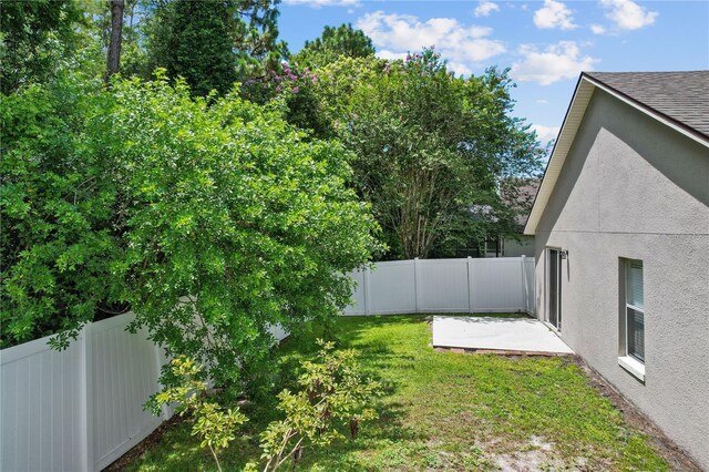 3388 Cypress Point Cir, Saint Cloud, FL 34772 - fenced backyard featuring a patio