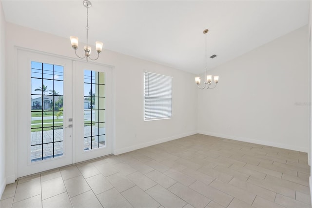 2912 SW Savona Blvd, Port St Lucie, FL 34953 - unfurnished dining area featuring a chandelier, lofted ceiling, and french doors