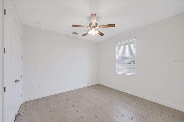 2912 SW Savona Blvd, Port St Lucie, FL 34953 - spare room with a ceiling fan and baseboards