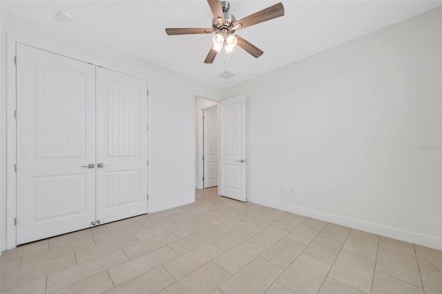 2912 SW Savona Blvd, Port St Lucie, FL 34953 - unfurnished bedroom with a closet and a ceiling fan