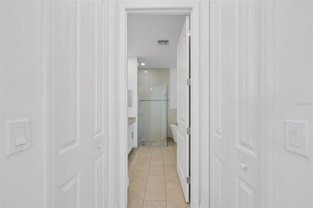 2912 SW Savona Blvd, Port St Lucie, FL 34953 - corridor with light tile patterned floors
