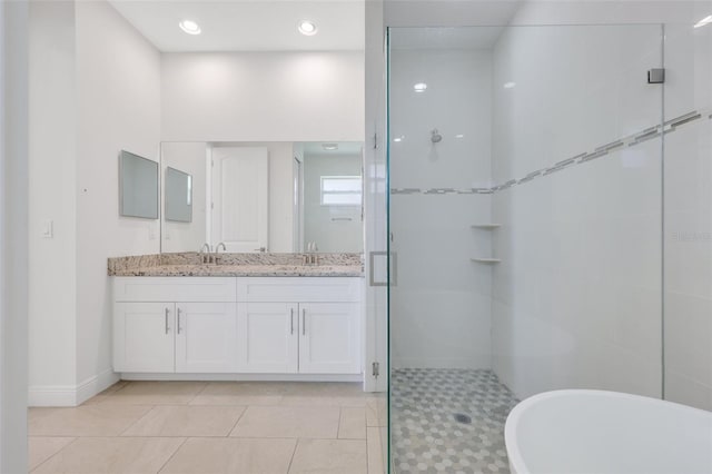 2912 SW Savona Blvd, Port St Lucie, FL 34953 - bathroom featuring a stall shower, double vanity, and a soaking tub