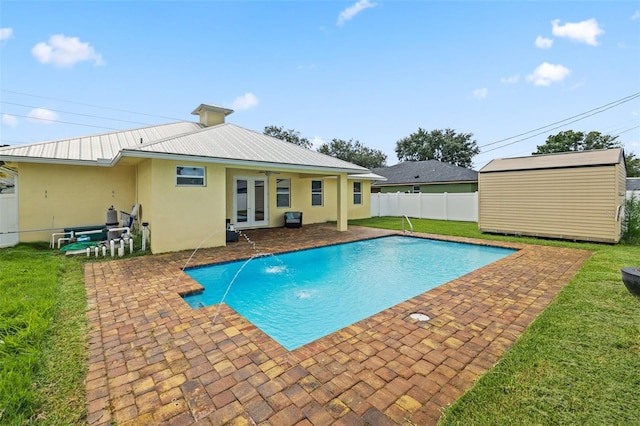 2912 SW Savona Blvd, Port St Lucie, FL 34953 - view of pool with a patio area, french doors, and a storage unit