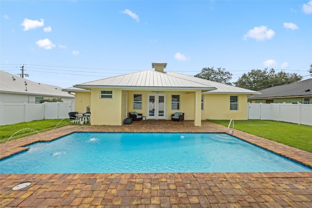 2912 SW Savona Blvd, Port St Lucie, FL 34953 - view of pool with french doors, a fenced backyard, and a patio area
