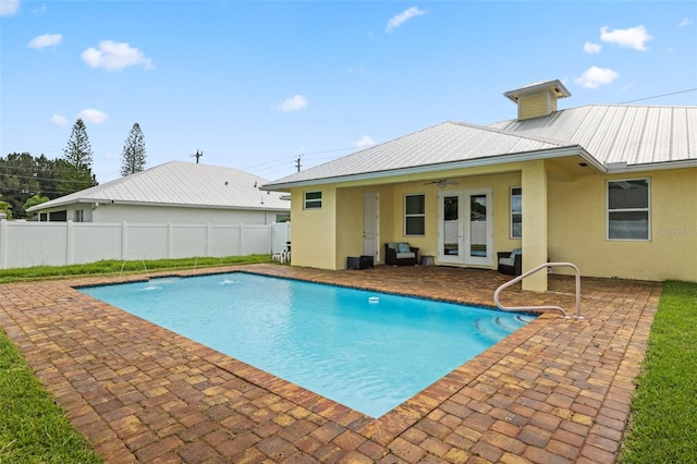 2912 SW Savona Blvd, Port St Lucie, FL 34953 - view of pool featuring french doors, a patio, and a ceiling fan